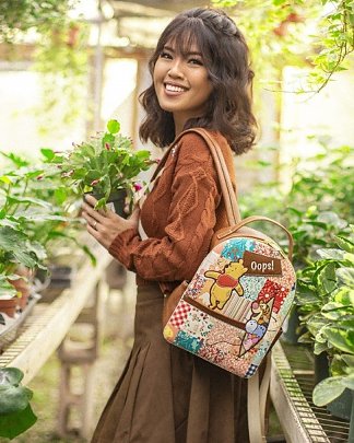 Disney Winnie The Pooh Patchwork Mini Backpack from Danielle Nicole